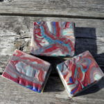 blue red fish scales cosmic waves soap